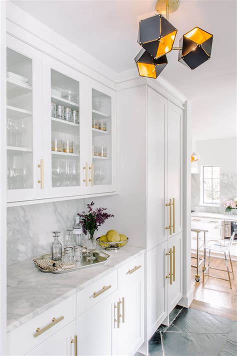 white and gold kitchen cabinets